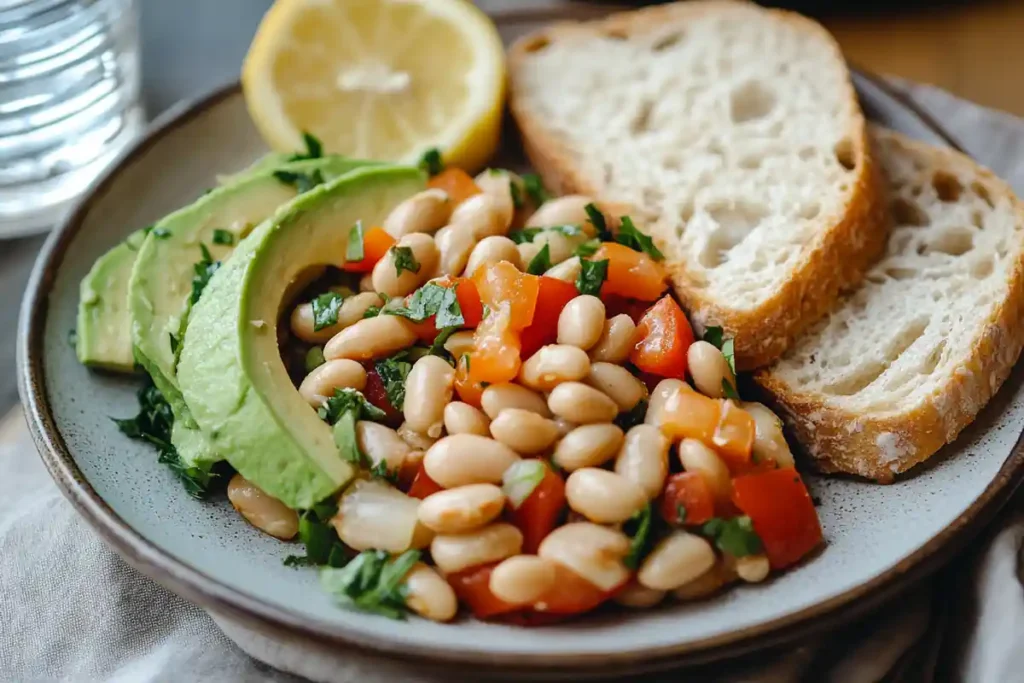 Bean salad paired with whole-grain bread and avocado.